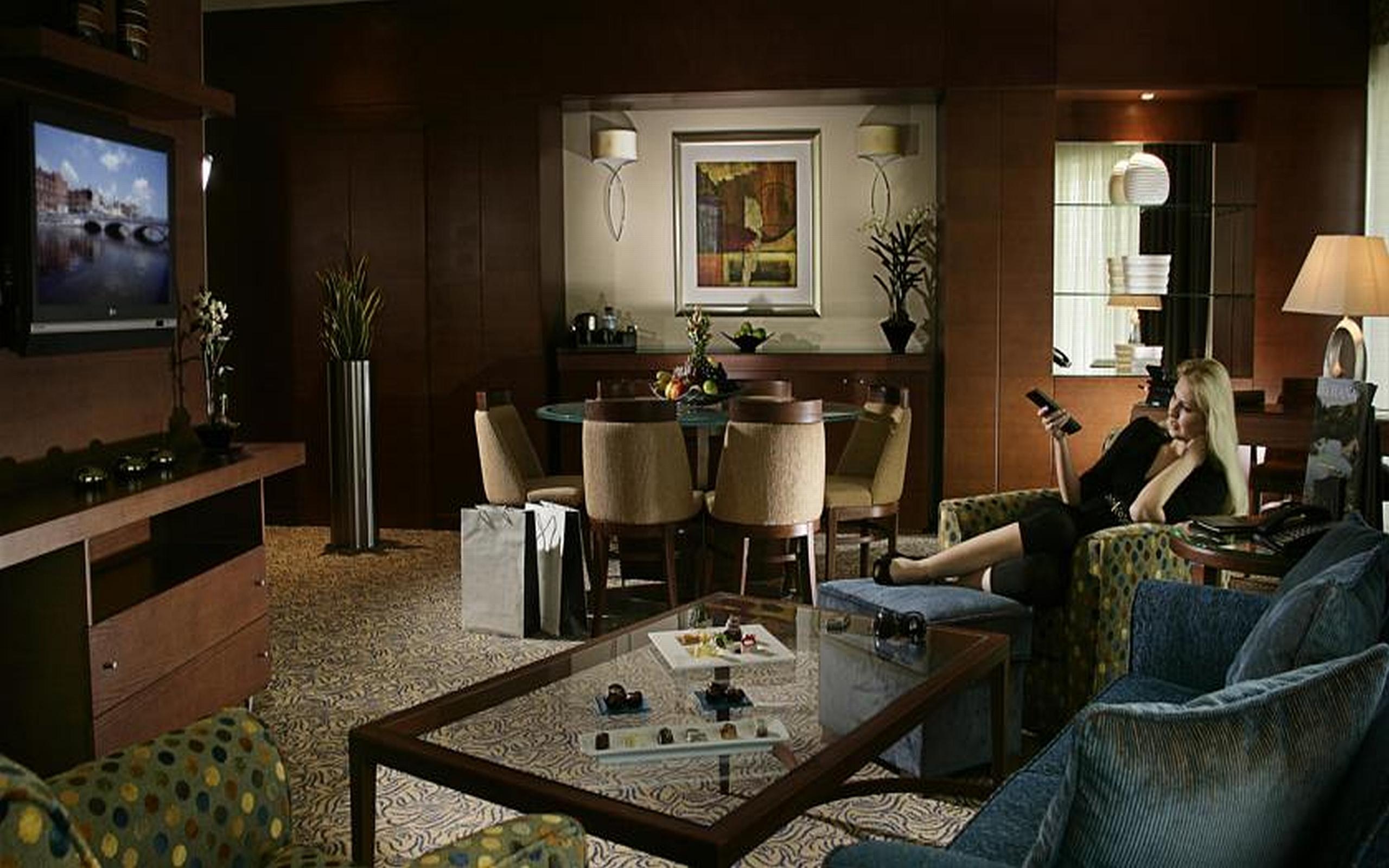 Hotel Al Ain Rotana Exterior foto A computer-generated image of a living room