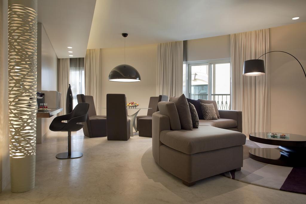 Hotel Al Ain Rotana Exterior foto A living room