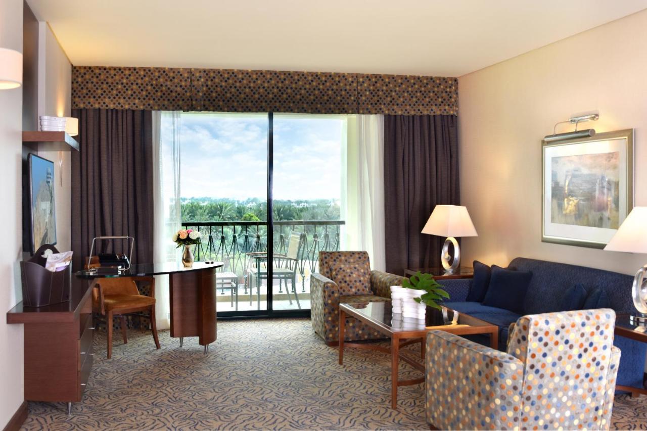 Hotel Al Ain Rotana Exterior foto A living room at the Hilton San Antonio Airport