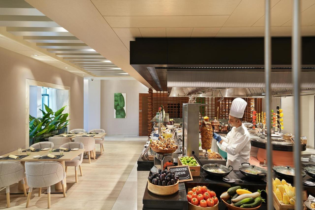Hotel Al Ain Rotana Exterior foto The restaurant